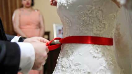 ما معنى الشريط الأحمر؟ لماذا يرتبط الحزام الأحمر بالعروس؟
