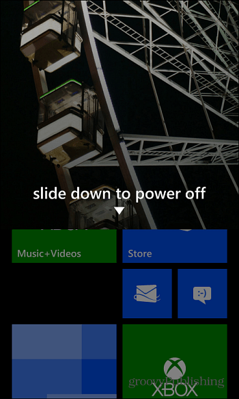 جانبًا لأسفل لإيقاف تشغيل Windows Phone 8