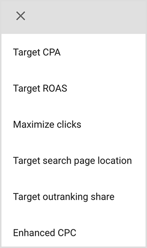 هذه لقطة شاشة لقائمة خيارات الاستهداف في إعلانات Google. الخيارات هي التكلفة المستهدفة للاكتساب ، وعائد النفقات الإعلانية المستهدف ، وزيادة النقرات ، وموقع صفحة البحث المستهدف ، وحصة المرتبة الأعلى المستهدفة ، وتكلفة النقرة المحسّنة. يقول مايك رودس إن خيارات الاستهداف الذكية في إعلانات Google تستخدم الذكاء الاصطناعي للعثور على الأشخاص الذين لديهم النية الصحيحة لإعلانك.