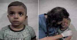 هكذا حاول الطبيب تهدئة الطفل الفلسطيني الذي كان يرتجف من الخوف أثناء العدوان الإسرائيلي