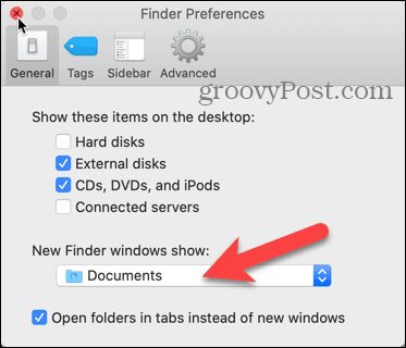 انقر فوق القائمة المنسدلة New Finder التي تظهر في Finder Preferences على جهاز Mac