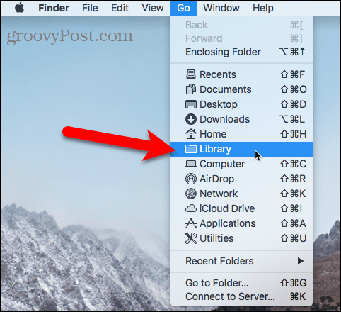 قم بالوصول إلى مجلد Library باستخدام قائمة Go في Finder على Mac